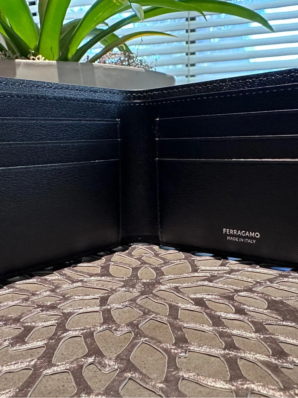 Salvatore Ferragamo Black Embossed Leather Bifold Wallet